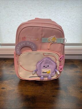 Pink Kids Backpack with Cute Purple Character Front Pocket New in package